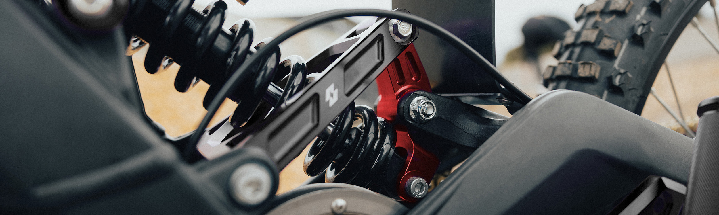 Full-E Charged Reinforced Suspension Linkage With Roller Bearings Red